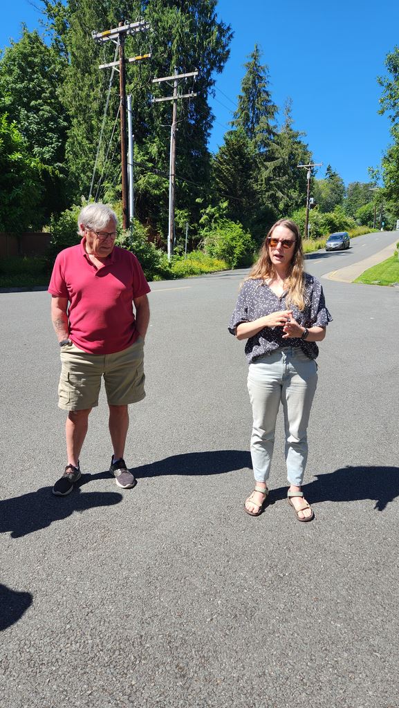 Brittany Ahmann of Salmon Solutions with volunteer Gary