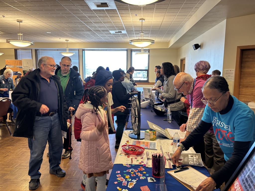 Jim Miller and Nadine Shanti engage the community at the MLK Celebration January 19 in Everett.
