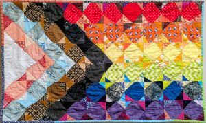quilt in pride colors