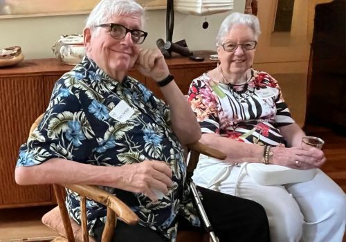Two Members at a Social Event