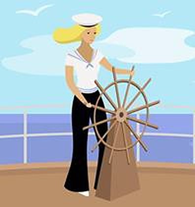 A lady sailor at the helm