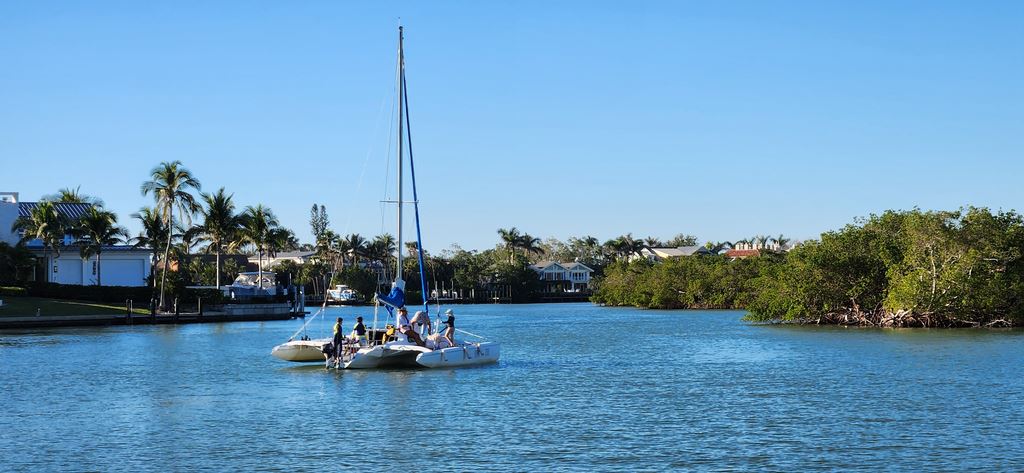 A club boat on the water