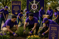 Psi Omega members participating in community service