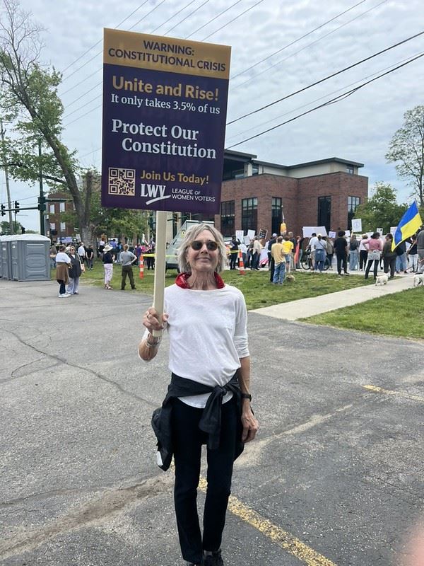 Unite and Rise Woman at Rally