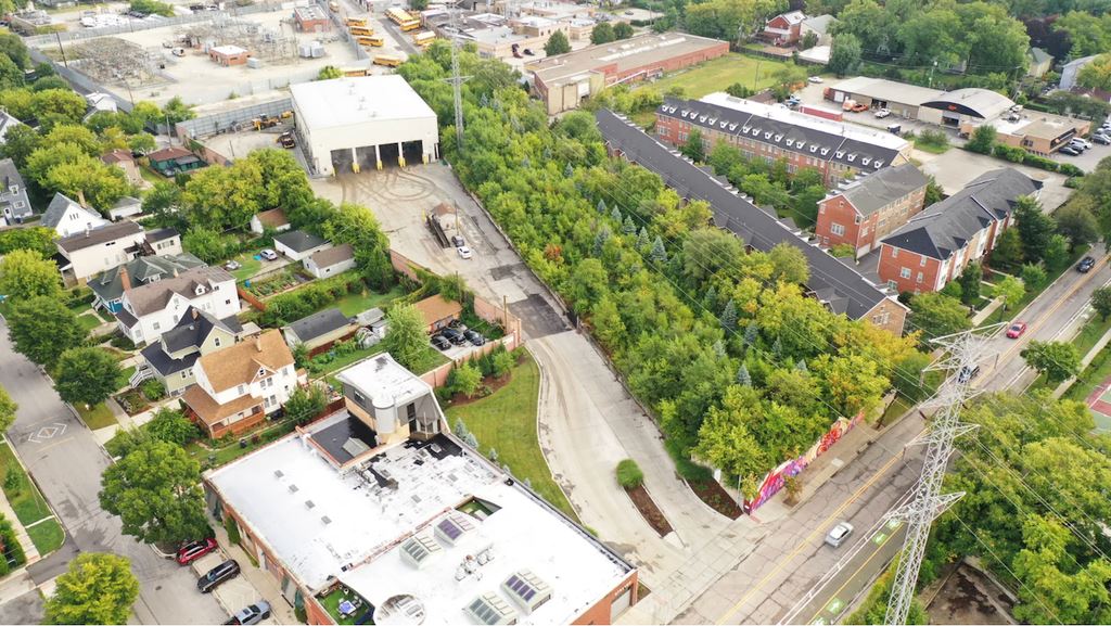 Trucks drive into the solid waste transfer station from Church Street. 