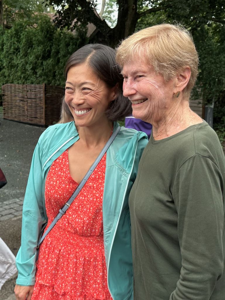 Eleanor smiles with everyone assembled for the unveiling of her honorary street sign