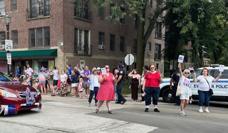 july 4 parade marchers cheering