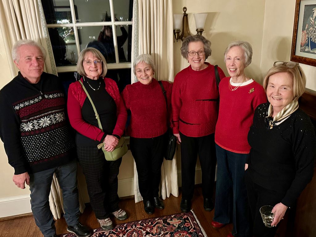 2025 Holiday party, red sweaters!