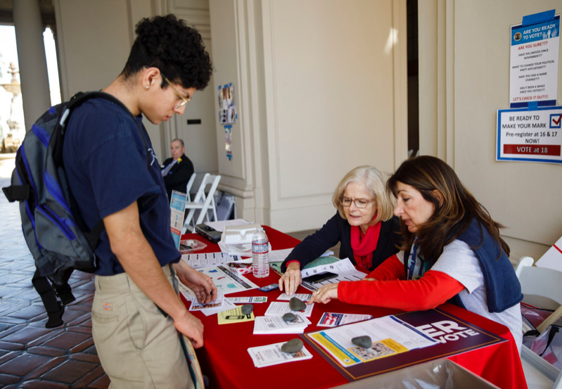 League of Women Voters volunteers registering student voters