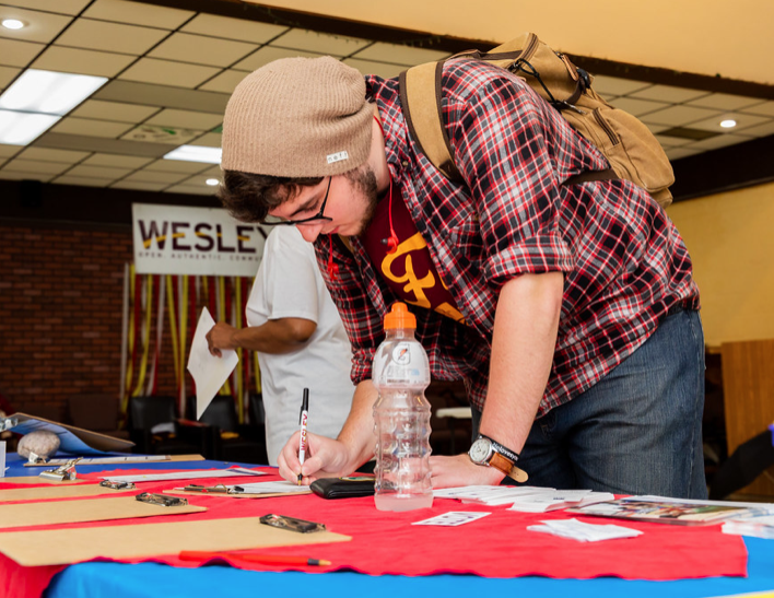 League of Women Voters volunteers registering students to vote