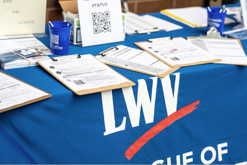 League of Women Voters volunteers' information table