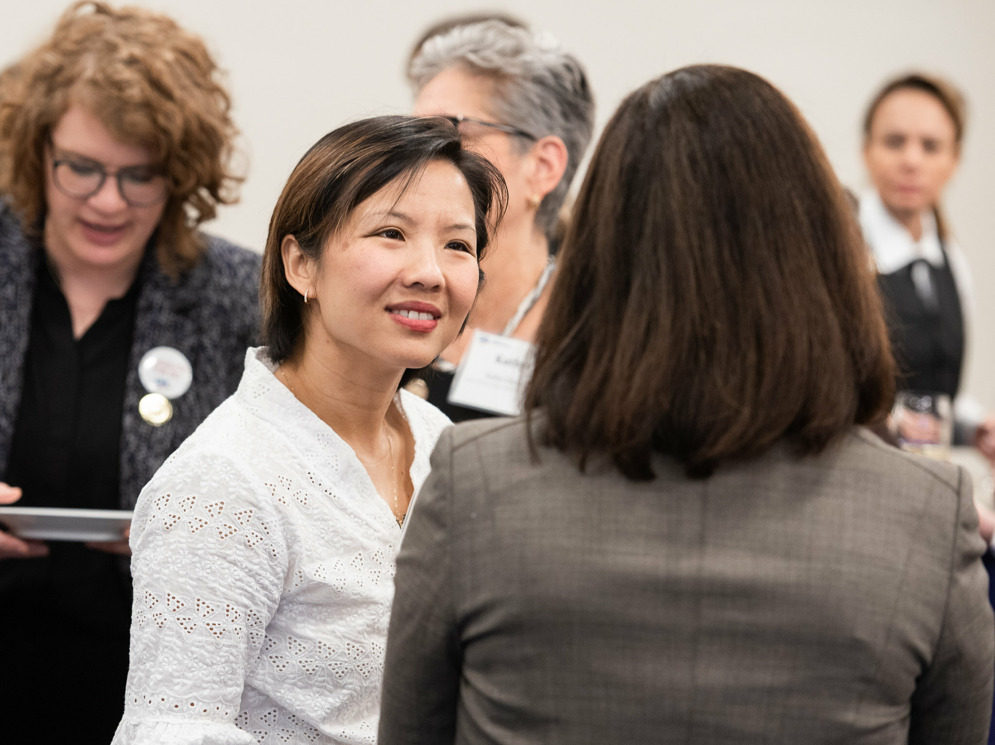 League members at meeting