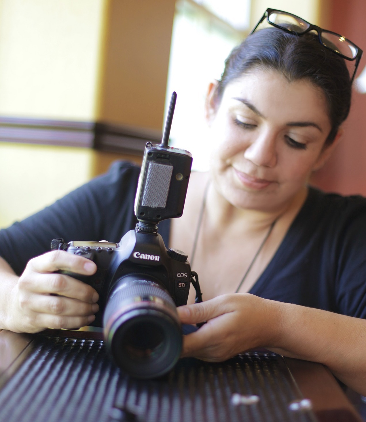 Latina photographer with camera