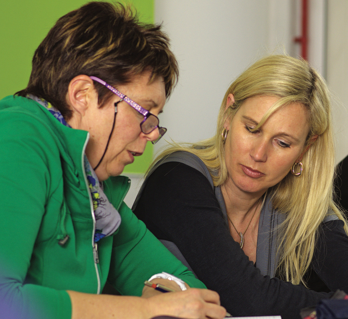 Women working with paperwork