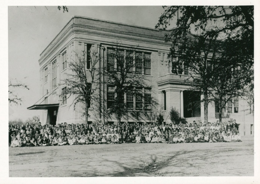 Austin History Center. A photo of students outside the Baker School around 1922