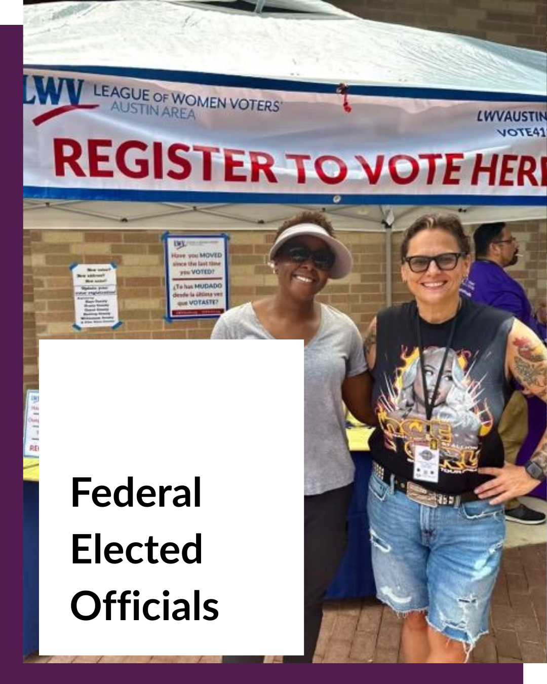 Two women in front of Register to vote sign