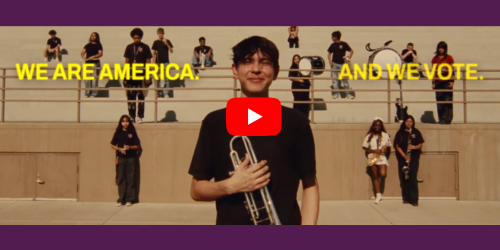 young man with a trombone at a stadium = We are America 