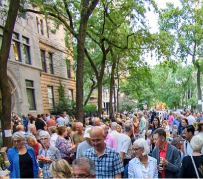 Group of people enjoying Evening on Astor