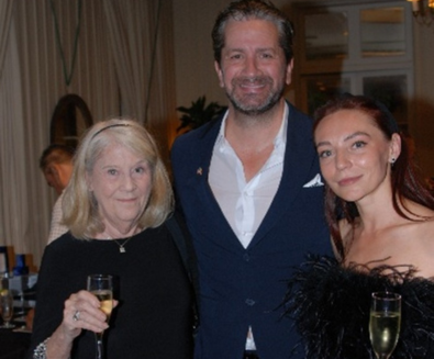 Group of members enjoying glass of wine