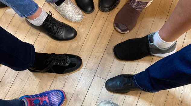 circle of shoes kick off image