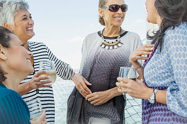 four_women_talking_with_drinks.jpg