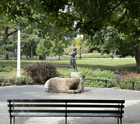 Statue of a girl in a park