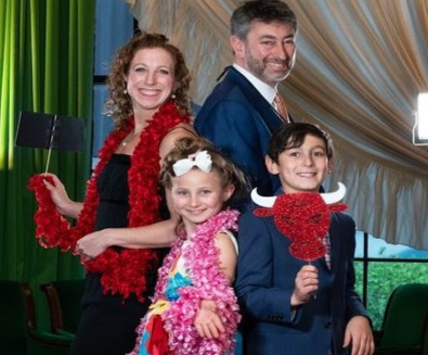 Family posing at event