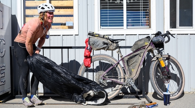 Meaghan, breaking "camp" on the 2026 Tour Divide - photo by Eddie Clark