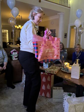 ANDREA ON HER SECOND GIFT I bet its a Snowman