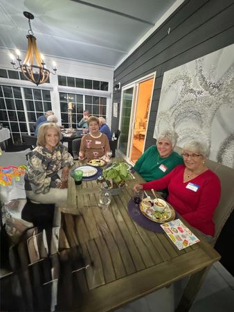 Friends Enjoying Conversation and Appetizers
