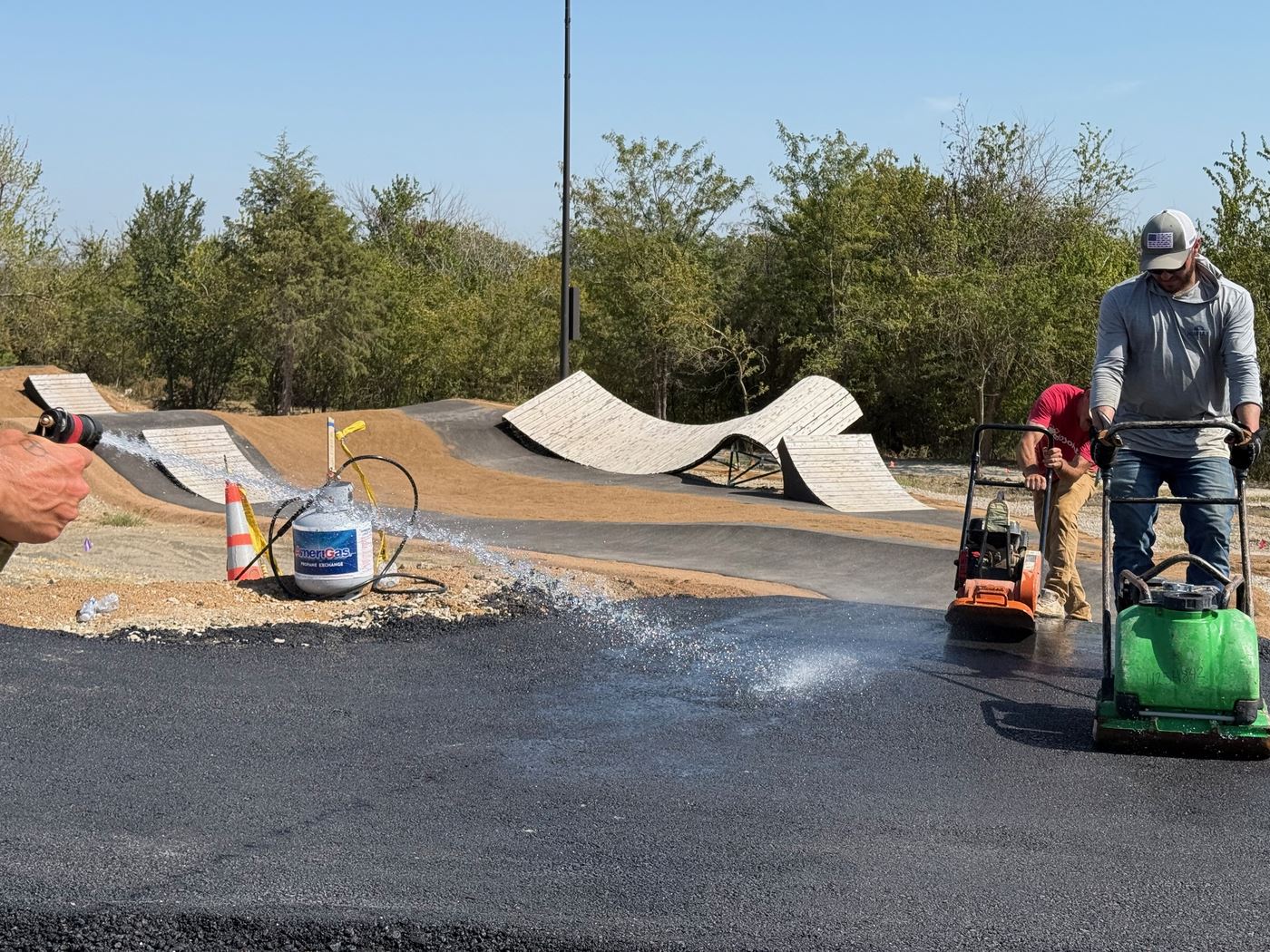 The build crew finishing the pump track