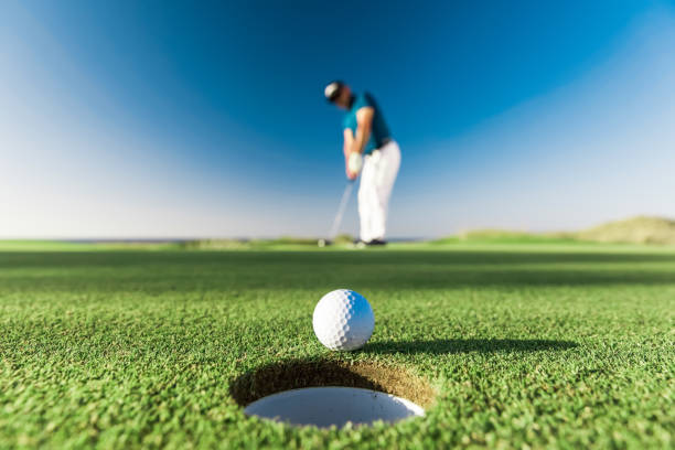 GOLFING 