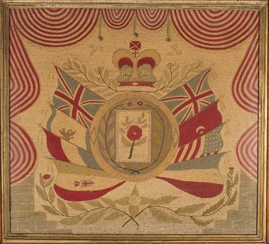 Square of fabric with  eight flags surrounding a central medallion below a crown