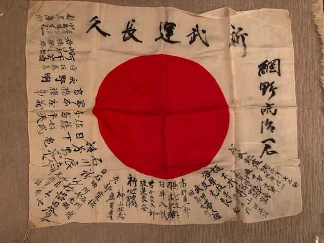Japanese flag with extensive hand-written inscriptions