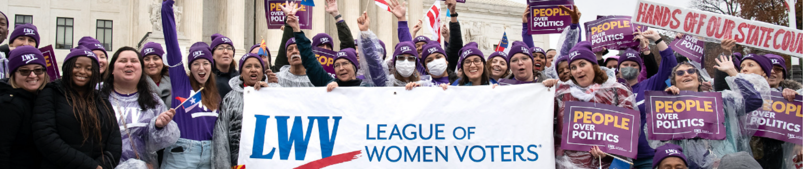 women_with_LWV_sign_2782_X_588px.png