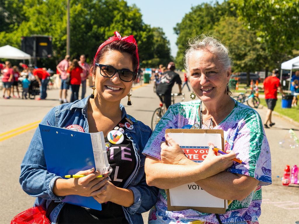 women with clipboards
