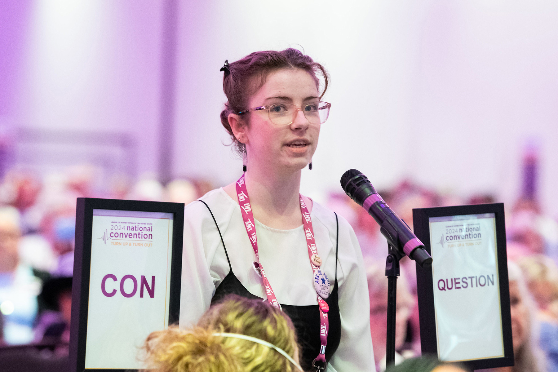League member at the national convention taking a position on a question