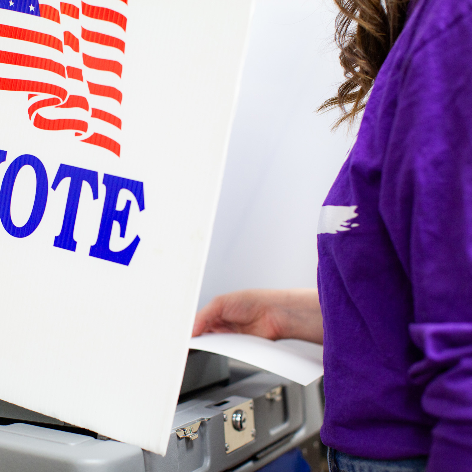 Voter with ballot