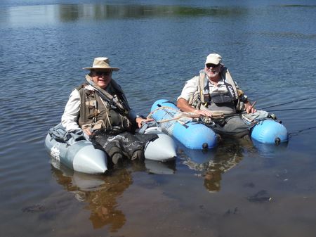 Two veterans in boats preparing to fish