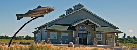 Shasta Trinity Fly Fishers clubhouse with trout sculpture