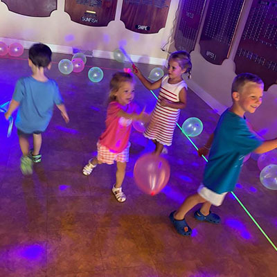 Untitled-2_0002_8_Glow_Party_with_Balloons_710338649.jpg