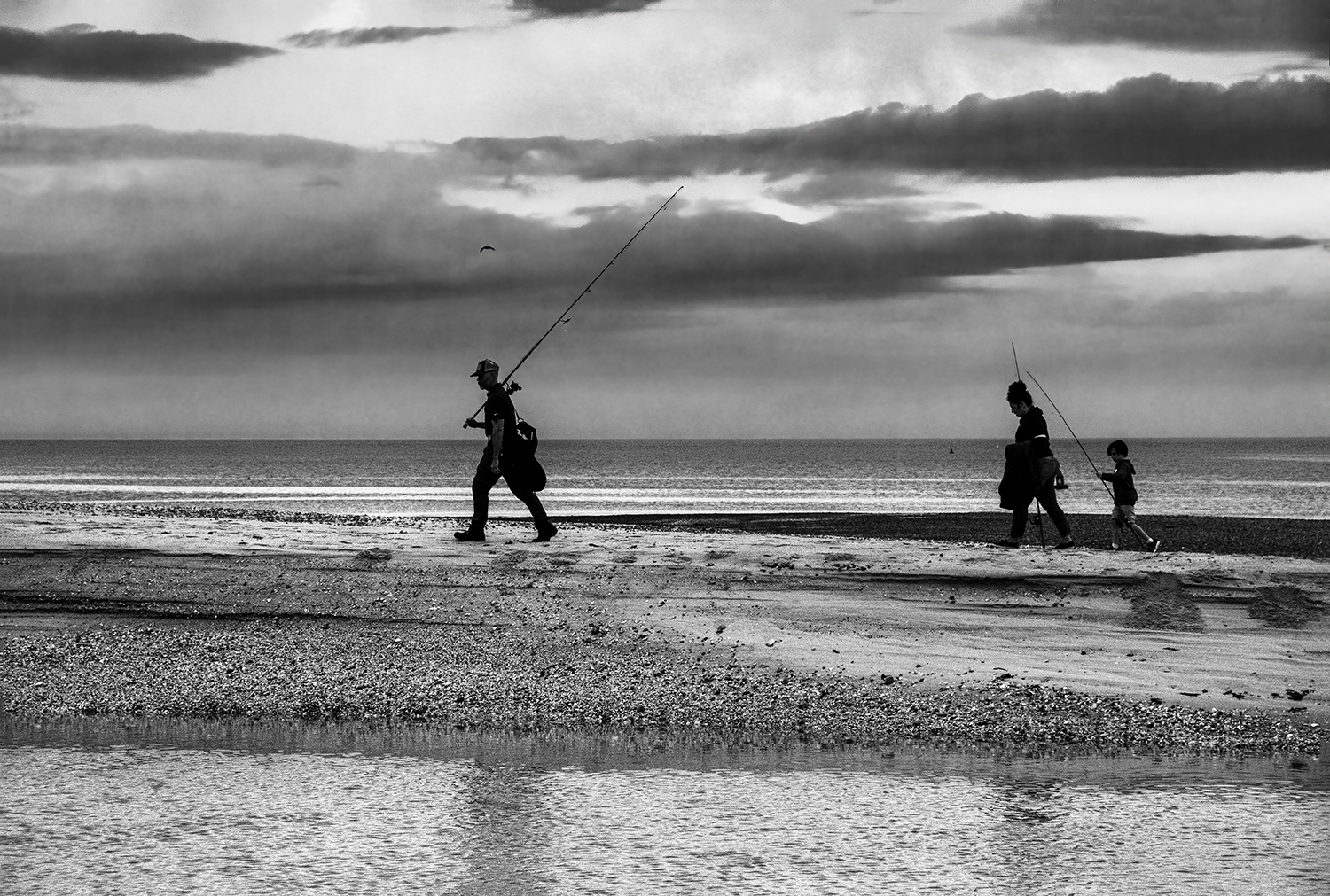 Fishermen at beach B&W