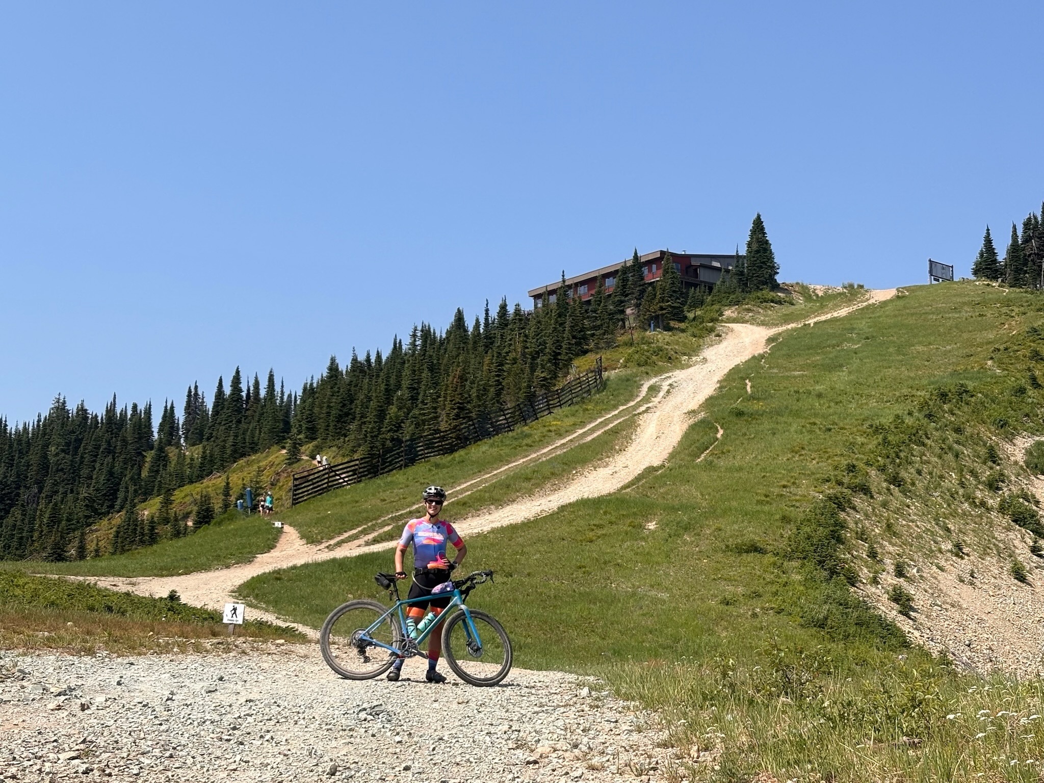 Katie at the bottom of the ski slope hike a bike
