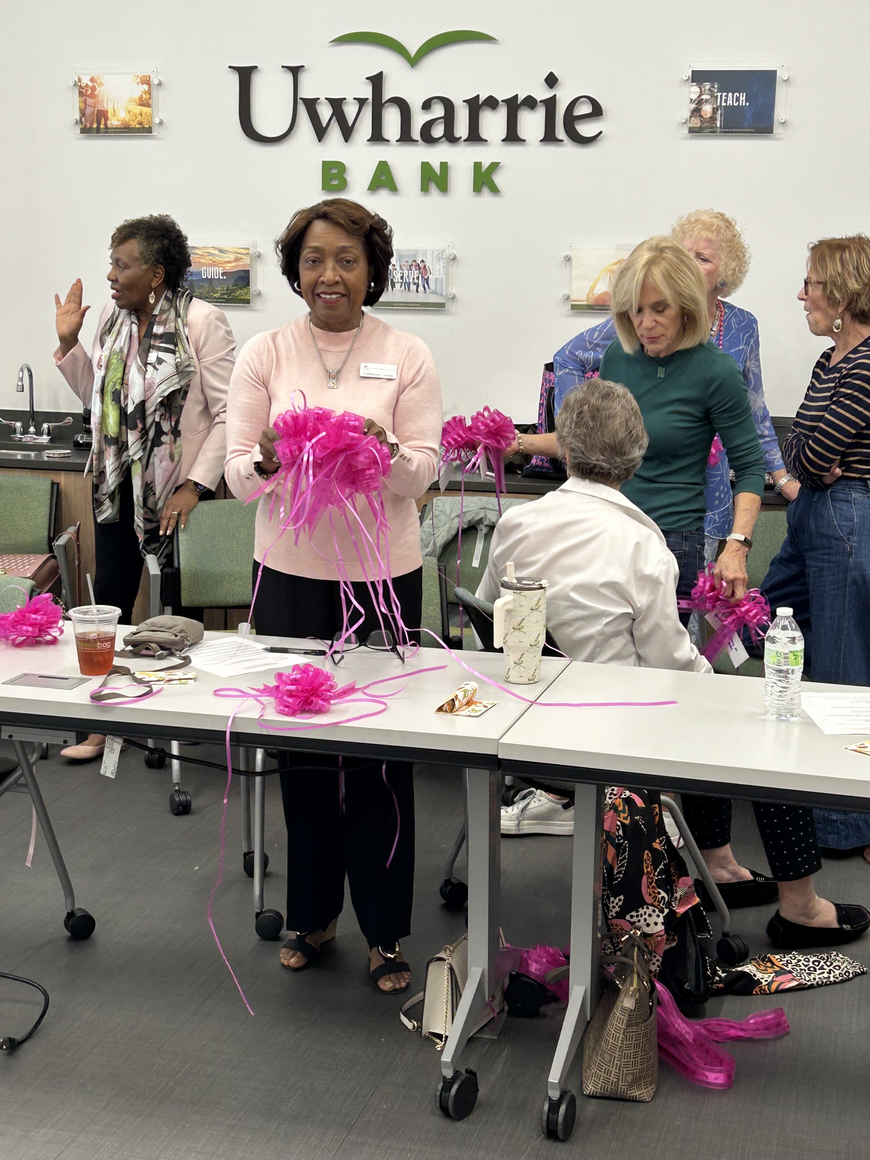Making bows for the Pink Bow Campaign 10.2025