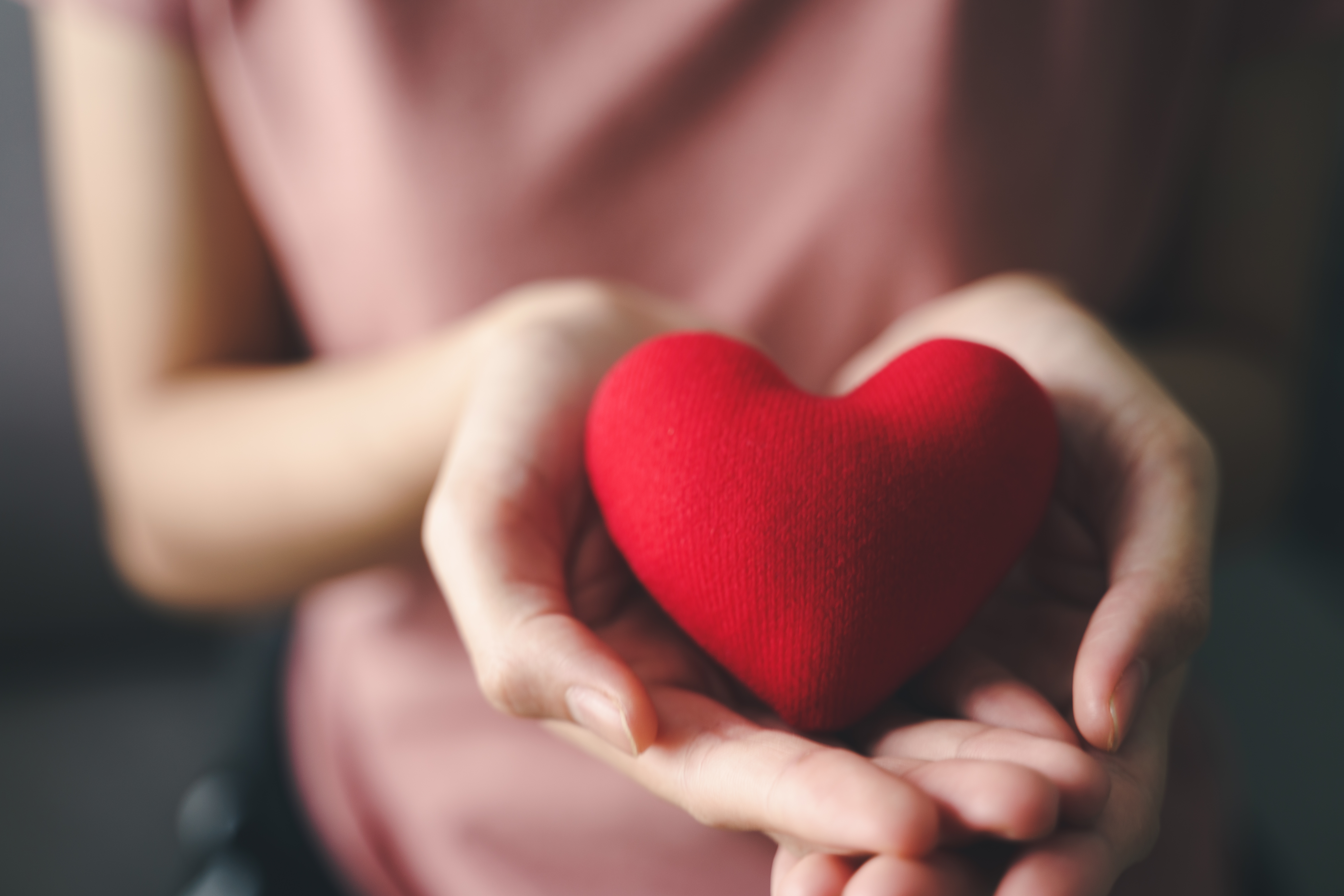 vecteezy_woman-holding-red-heart-love-health-insurance-donation_4572735.jpg