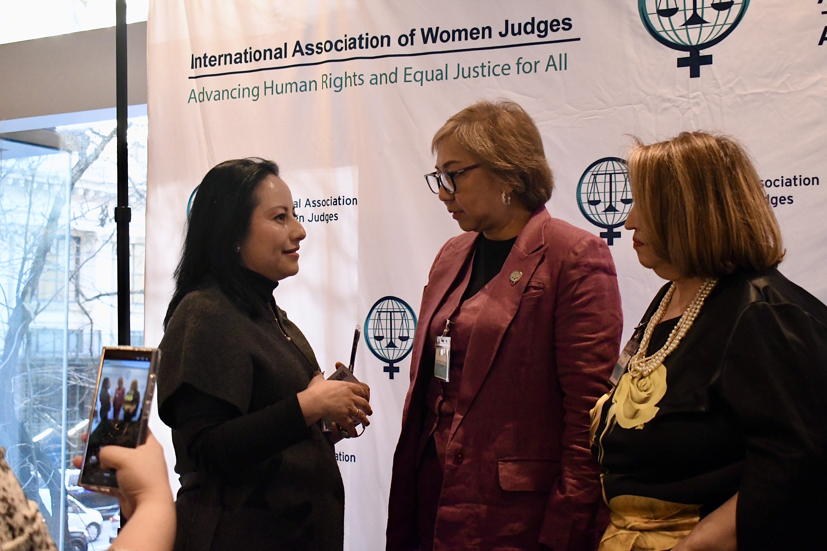 Justice Maria Filomena D. Singh in discussion during the reception