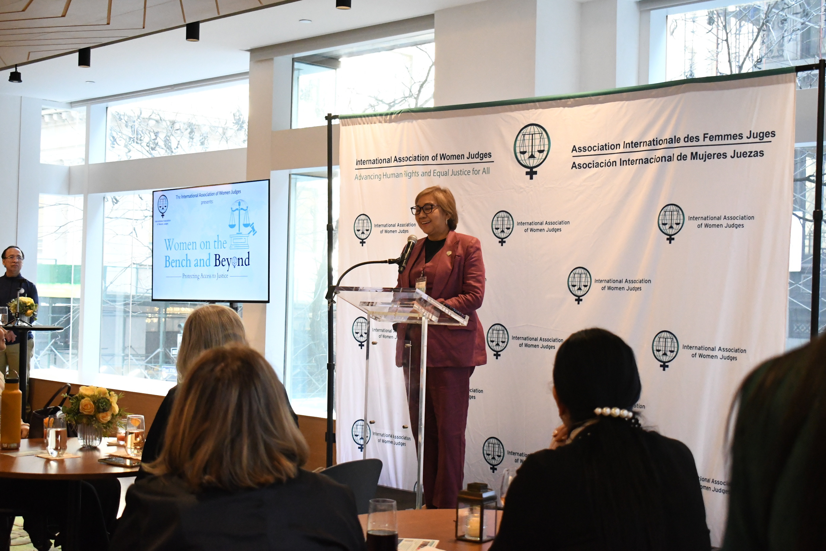 Justice Maria Filomena D. Singh delivering remarks