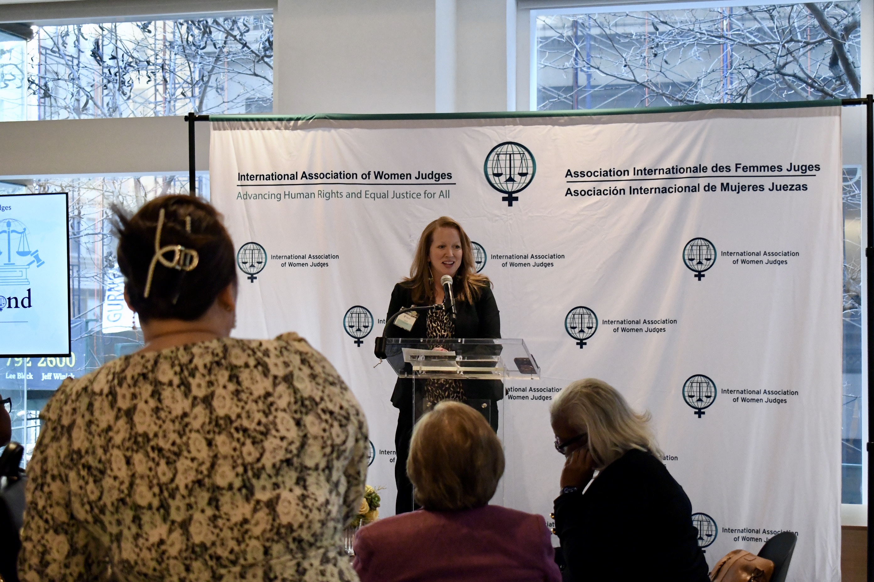 Sarah E. Turberville speaking at the IAWJ reception